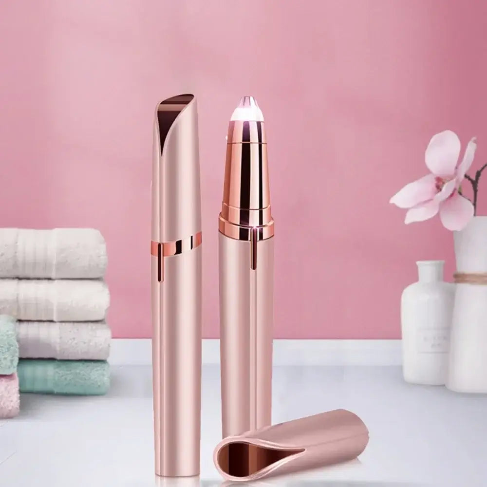 Rose gold electric facial hair removal device with a sleek, lipstick-like design.