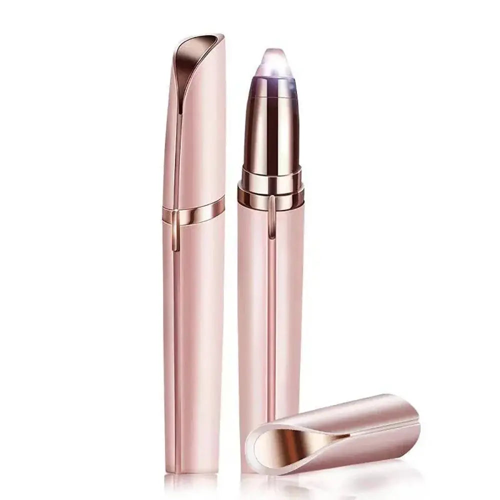 Sleek rose gold electric eyebrow trimmer with a detachable cap.