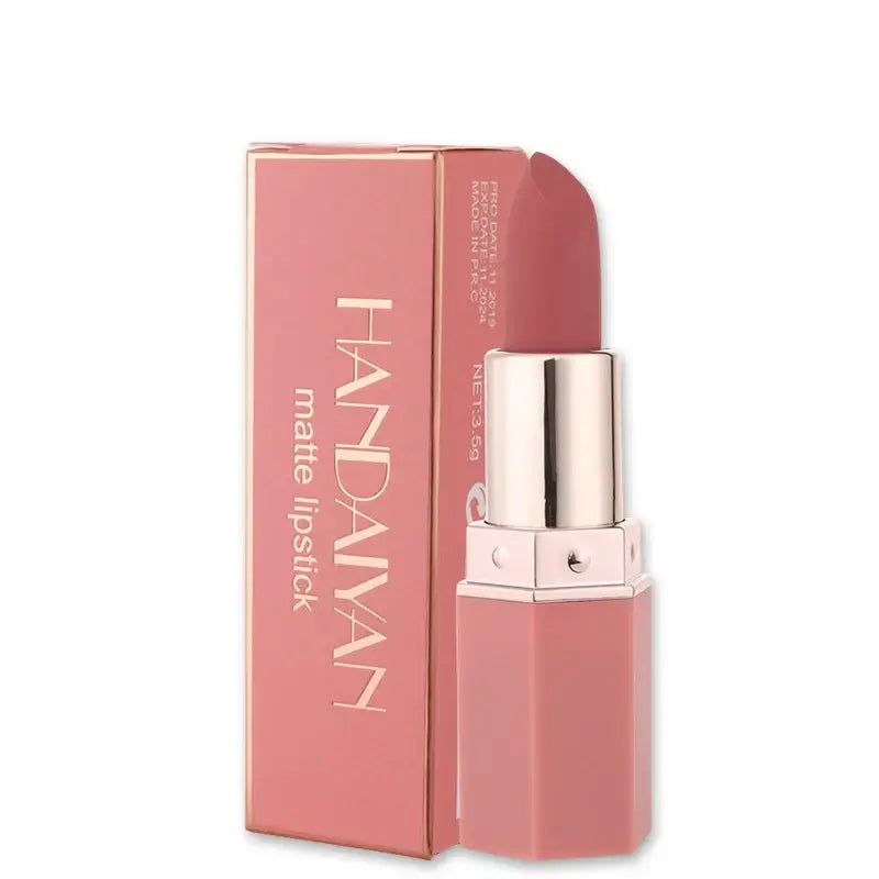 Pink lipstick in a metallic tube with its matching packaging box.