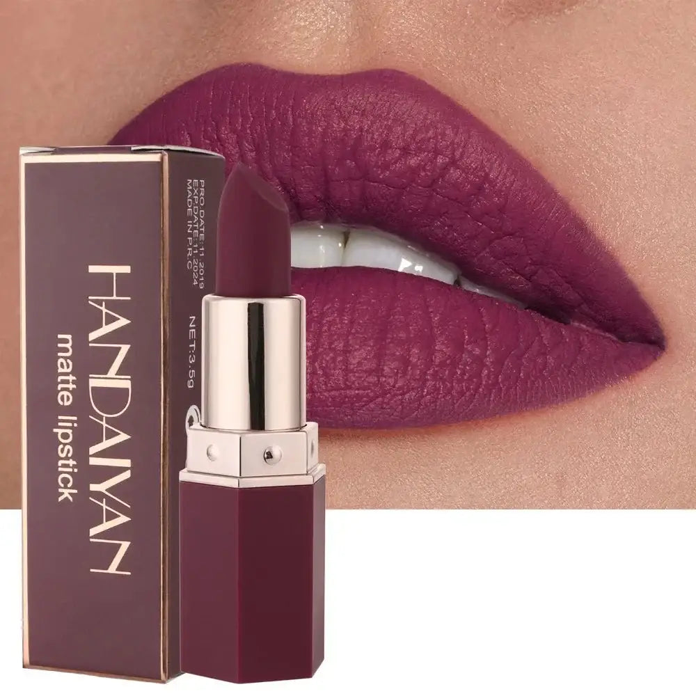 Purple lipstick in a metallic tube with matching packaging.