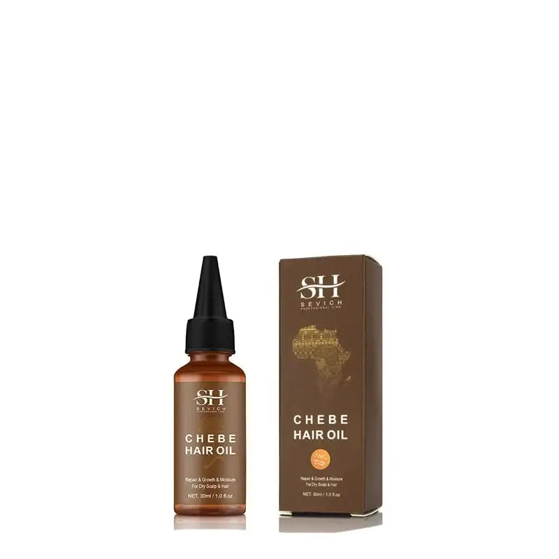 Bottle of Chebe hair oil with its product packaging box.