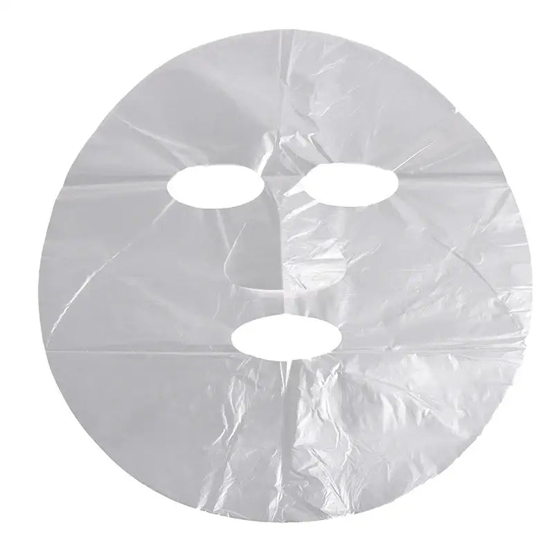 Sheet face mask with cutouts for eyes and mouth.