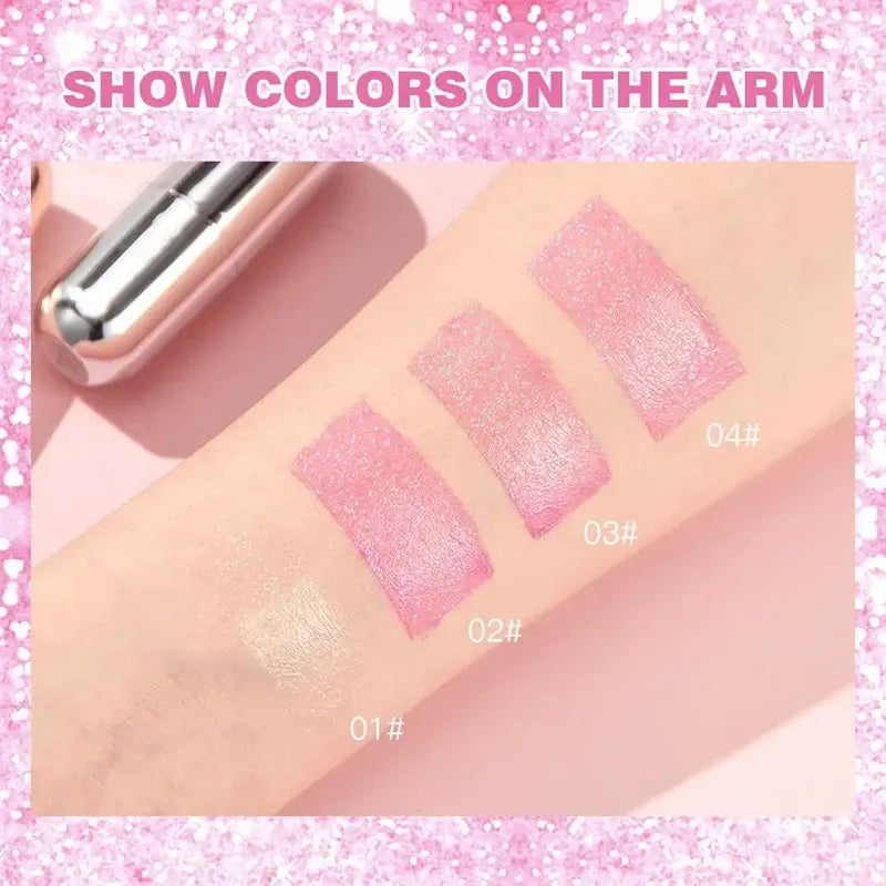 Swatches of pink lip gloss or lipstick shades on skin.