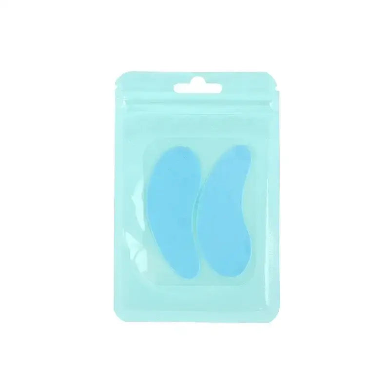 Pair of blue gel eye masks in a light teal packaging pouch.