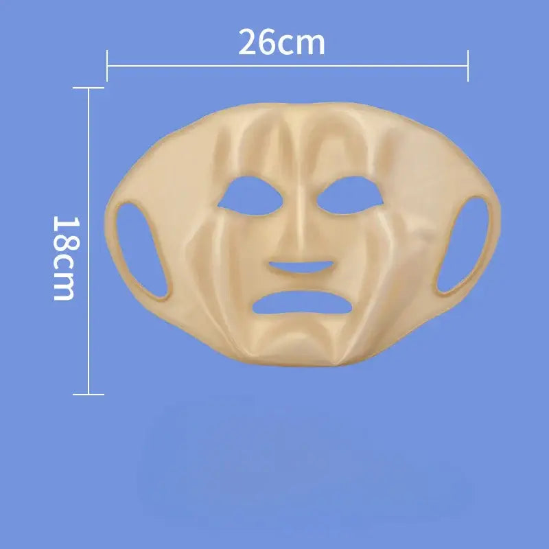 Beige face mask with eye and mouth cutouts, measuring 26cm wide by 18cm tall.