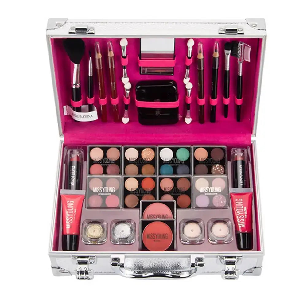 Makeup kit in a silver case with pink interior containing various cosmetic products.