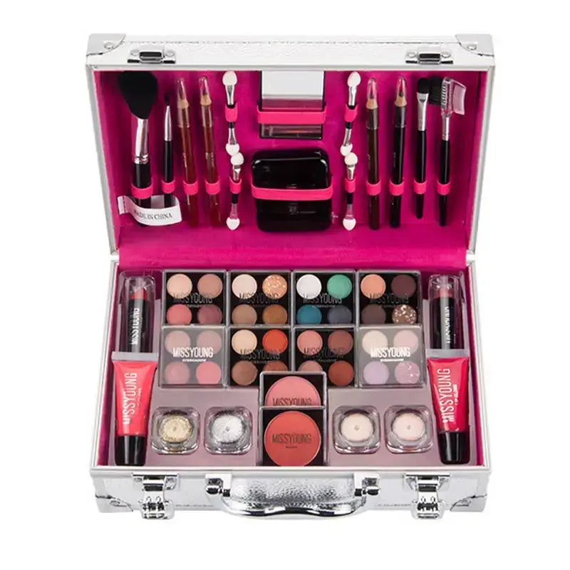 Makeup kit in a silver case with various cosmetic products arranged inside.