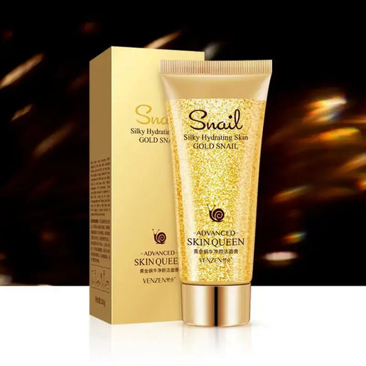 Gold-colored skincare product tube and box labeled ’Snail Silky Hydrating Skin’ by Skin Queen.