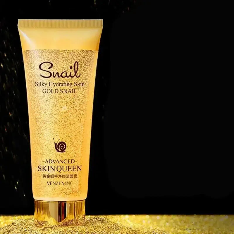 Gold-colored tube of ’Snail’ skincare product from Skin Queen brand.