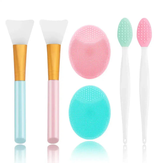 Collection of skincare and makeup tools including brushes, silicone cleansing pads, and facial scrubbers.