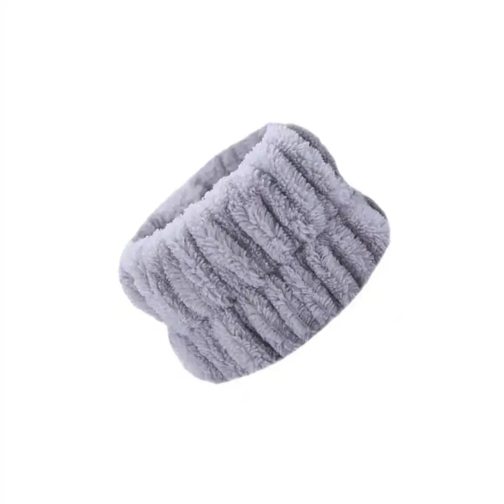 Fluffy gray fur headband or ear warmer.