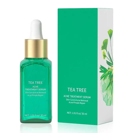 Green glass bottle of tea tree acne treatment serum with dropper cap and matching product box.