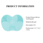 Teal Heart-Shaped Silicone Makeup Brush Cleaning Pad - Vignette | VogueBeautify