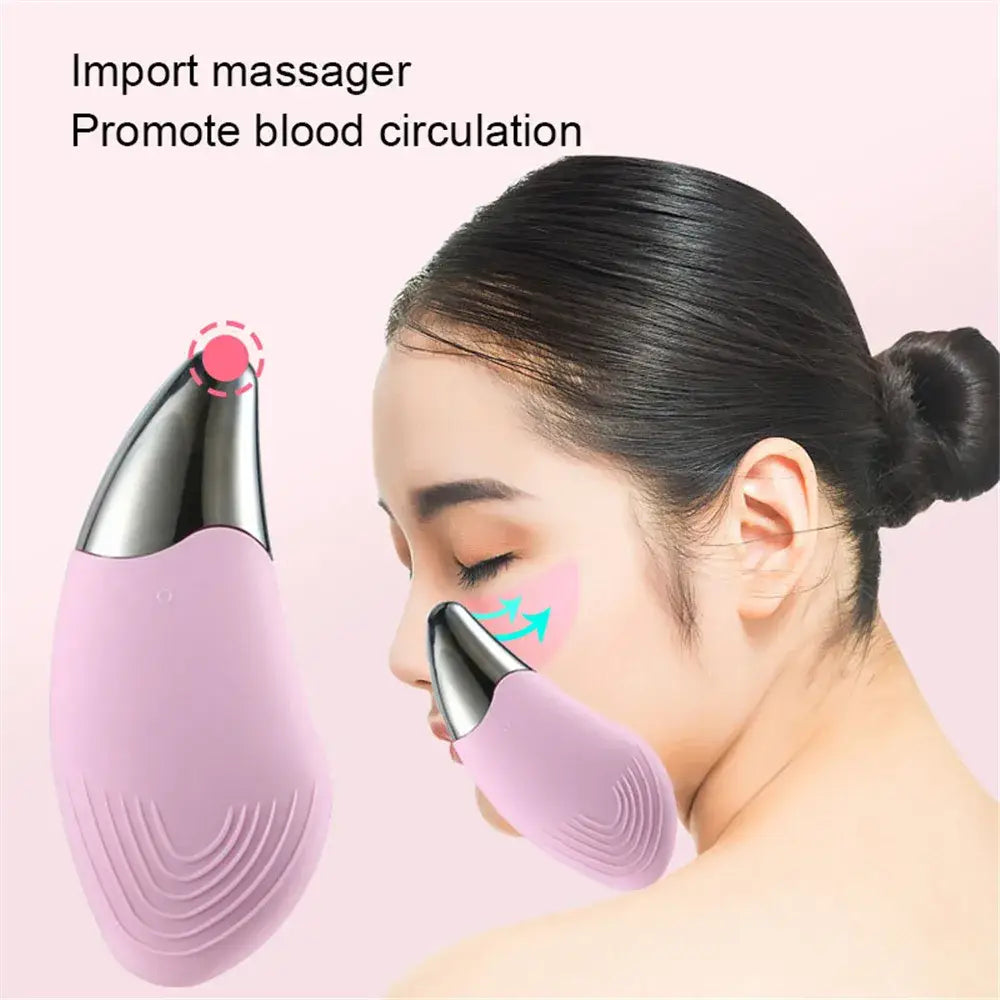 Handheld facial massager device with a pink silicone body and metal tip.