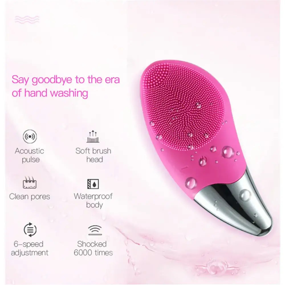 Pink silicone facial cleansing brush with a metallic base.