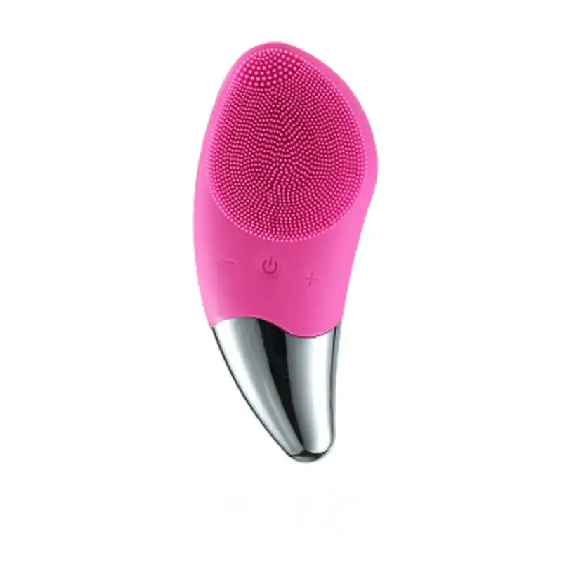 Pink silicone facial cleansing brush with a metallic silver handle.