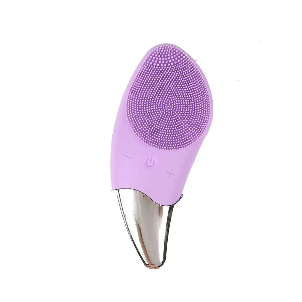 Purple silicone facial cleansing brush with a metallic handle.