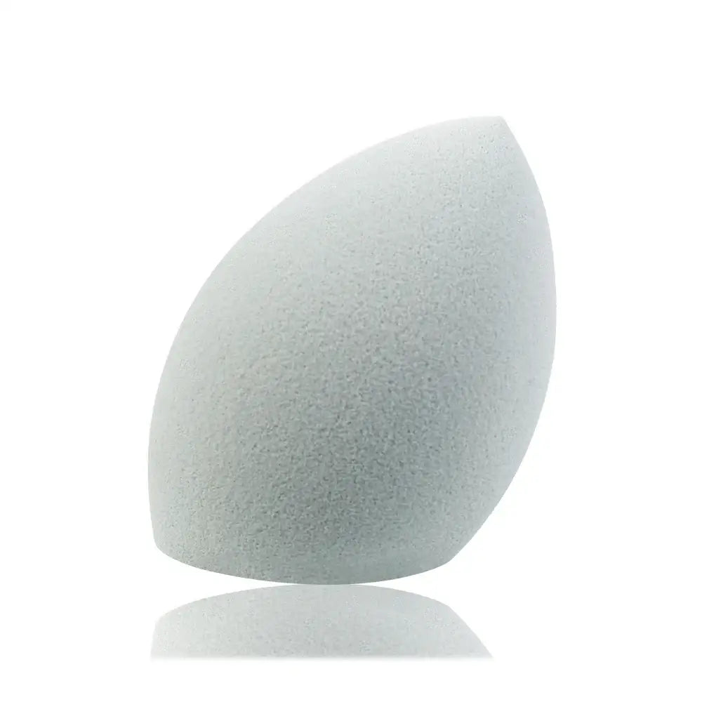 White, teardrop-shaped makeup sponge or beauty blender.