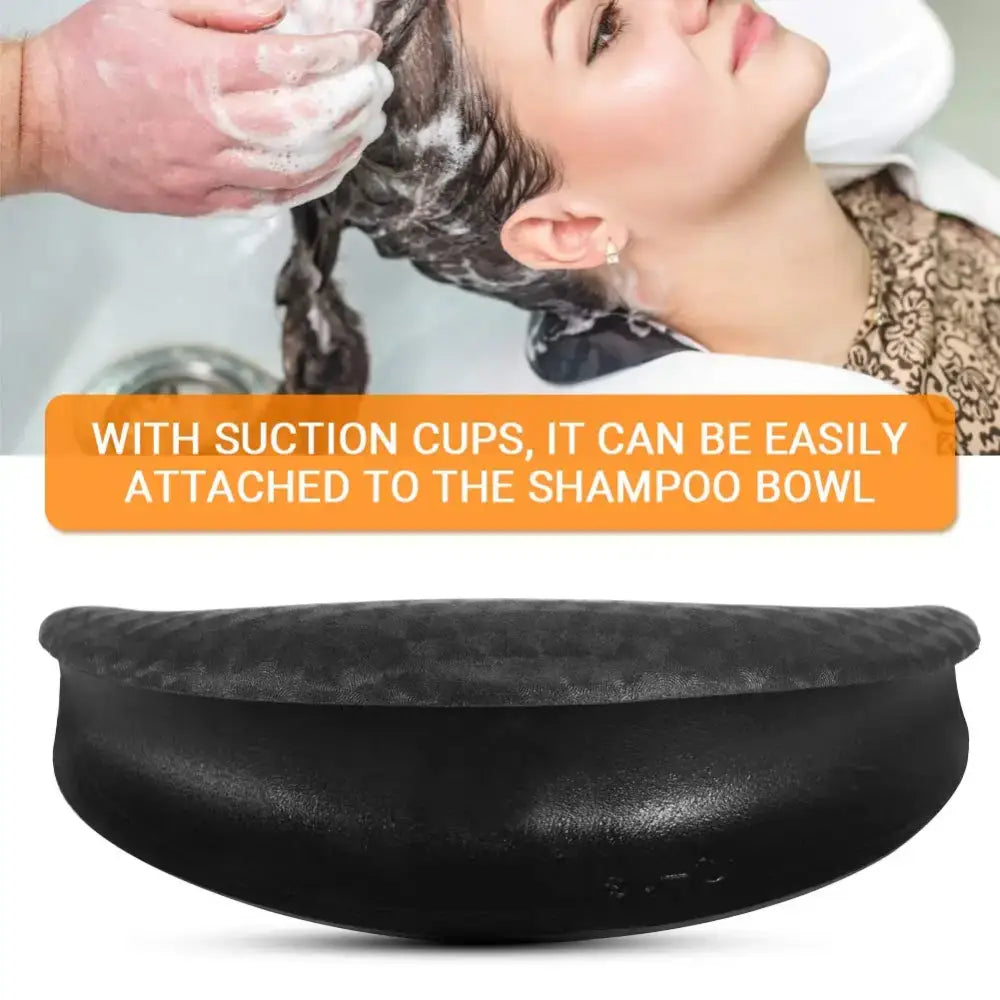 Black curved shampoo bowl with suction cups for attachment.