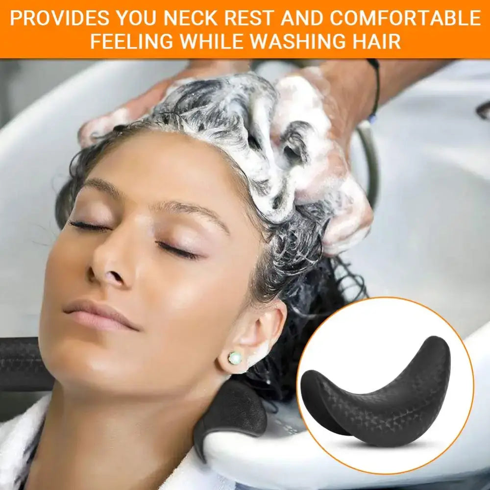 Curved neck support cushion for hair washing comfort.