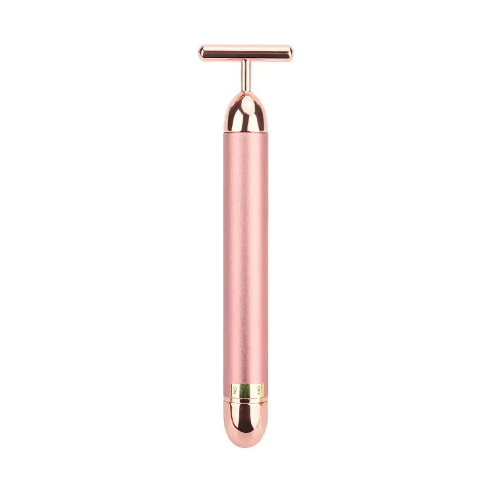 Rose gold facial massage roller with a T-shaped handle.