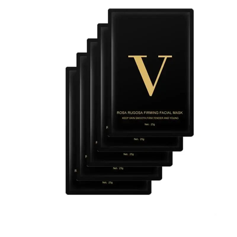 Stack of black facial mask packets with a gold ’V’ logo.