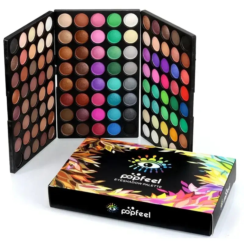 Colorful eyeshadow palette with multiple shades arranged in a foldable case, accompanied by its packaging box.