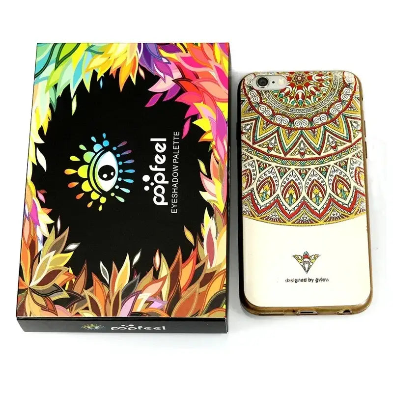 Colorful phone case with a mandala-inspired design next to its packaging box.