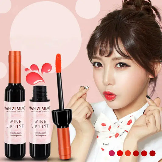 Wine bottle-shaped lip tint product with a woman modeling red lipstick.