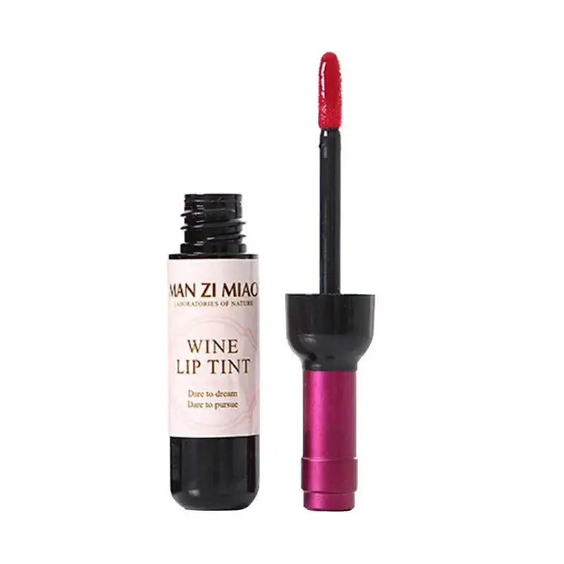 Wine lip tint with an open applicator wand.