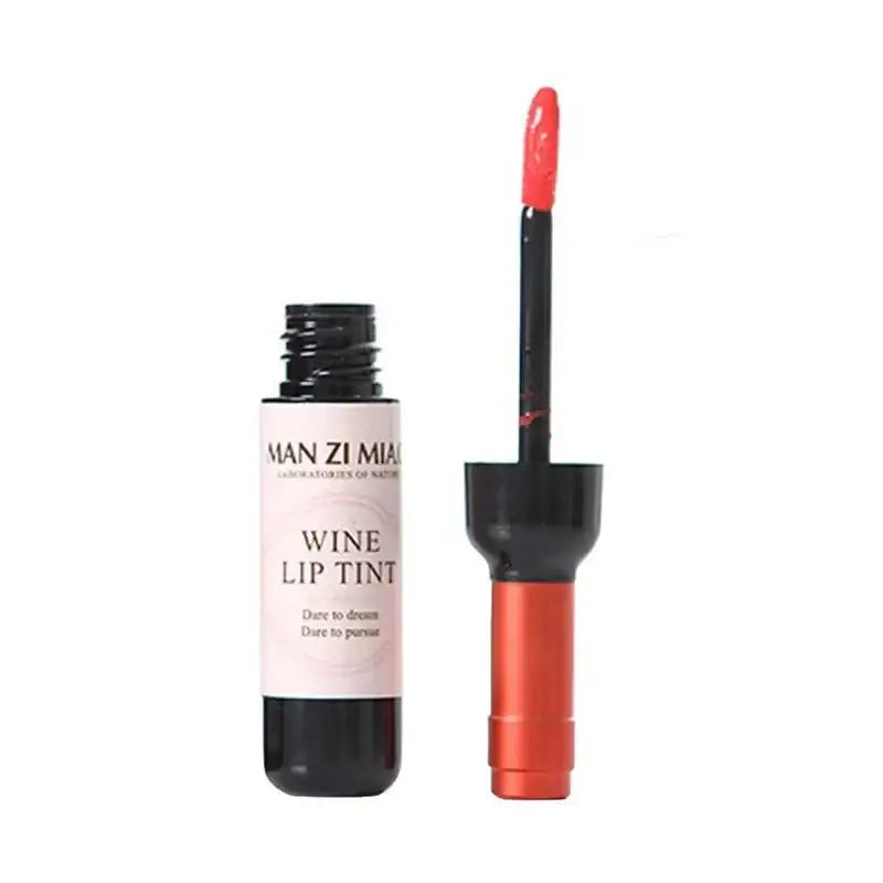 Wine lip tint with an open applicator wand.