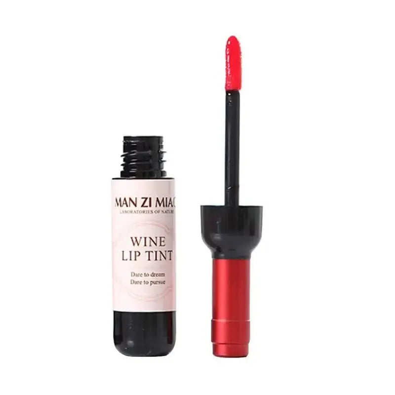 Wine lip tint with an open applicator wand.