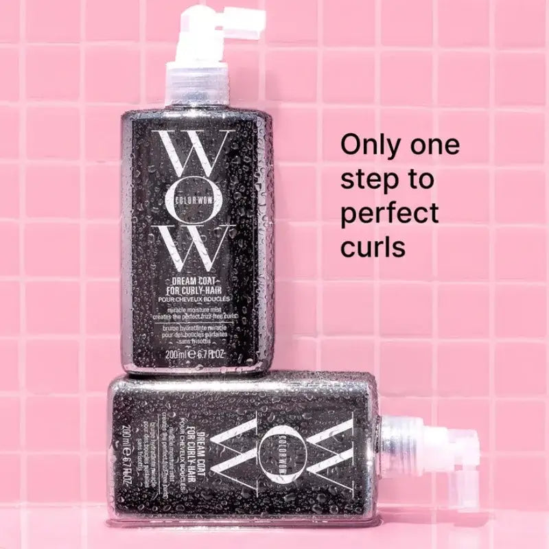 Black hair styling product bottle with ’WOW’ branding and a spray nozzle.